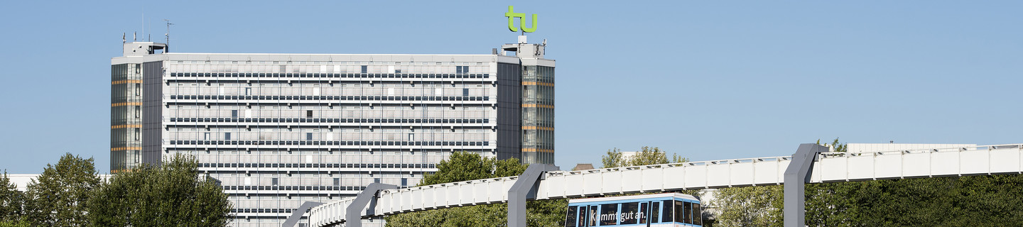 Math tower and H-Bahn with blue sky in the background