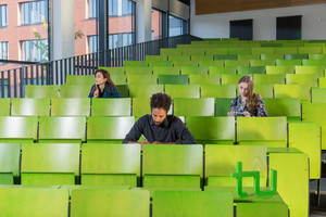 Students sitting in the seminar building